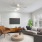 Living room with 3 large windows at Briarhill Atlanta apartments in Atlanta, GA